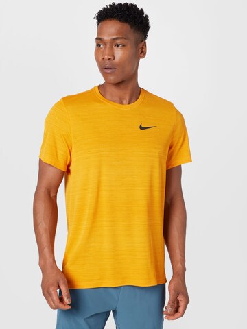 NIKE Performance shirt 'Superset' in Yellow: front