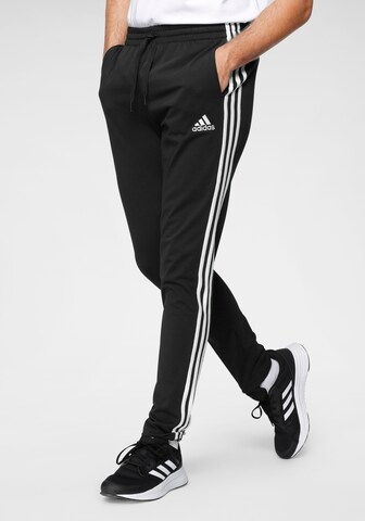 ADIDAS SPORTSWEAR Tapered Urheiluhousut 'Essentials' värissä musta