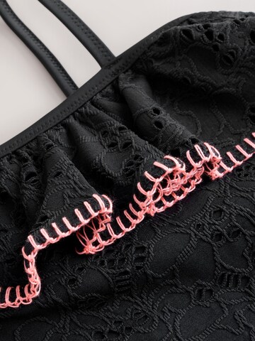 juoda Next Maudymosi kostiumėlis