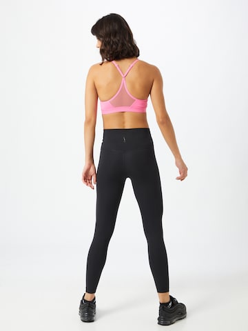 NIKE Skinny Sportbroek in Zwart