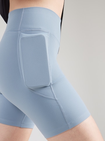 UNDER ARMOUR - Skinny Pantalón deportivo 'Motion' en azul