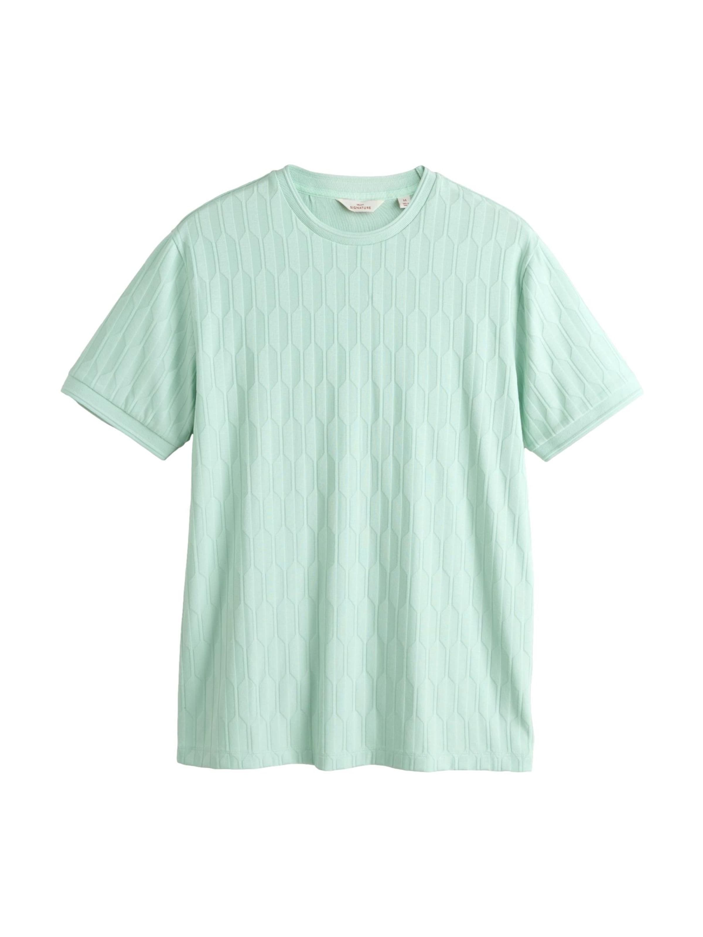 Tricou de la Next pe verde: față