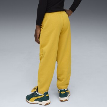 PUMA Tapered Trousers 'Moody Cat' in Yellow
