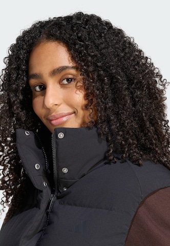 Gilet 'Helionic' di ADIDAS SPORTSWEAR in nero