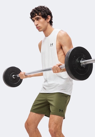 UNDER ARMOUR Regularen Športne hlače | zelena barva