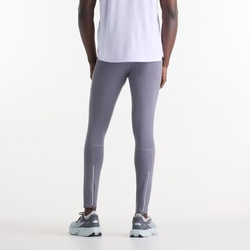new balance Slimfit Sportbroek 'Reflective RC Heat Tight 28"' in Grijs