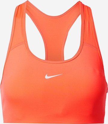 Reggiseno sportivo di NIKE in arancione: frontale