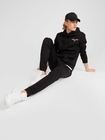 BJÖRN BORG Tapered Workout Pants 'ESSENTIAL' in Black