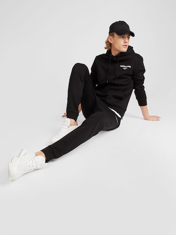 BJÖRN BORG Tapered Sportbroek 'ESSENTIAL' in Zwart