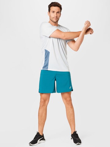 ASICS Regularen Športne hlače 'ROAD' | modra barva