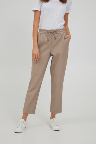 Oxmo Loosefit Broek 'PAULIA' in Beige: voorkant