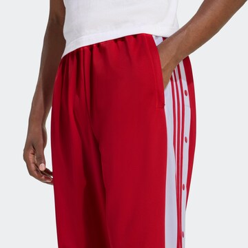 ADIDAS ORIGINALS Loose fit Pants in Red