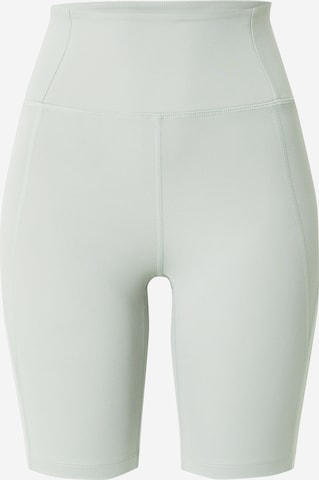 Girlfriend Collective Skinny Workout Pants in Green: front