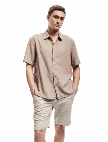 Koton Regular Pants 'Bermuda' in Beige: front