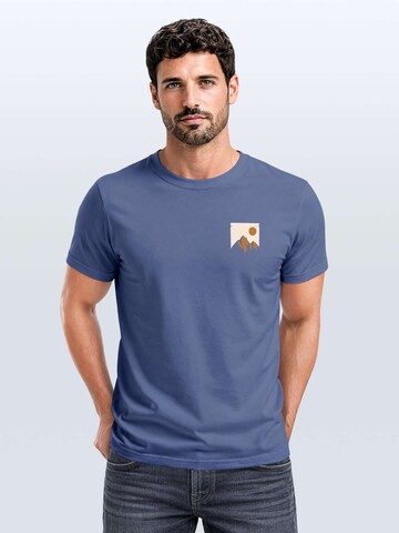 Neverless Shirt 'Mointain Badge'‌‌‌‌‌‌‌‌‌‌ in Blau: Vorderseite