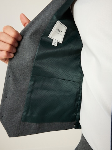 Next Telovnik | siva barva