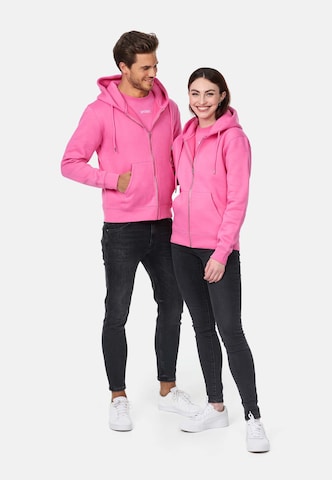 Veste de survêtement smiler. en rose