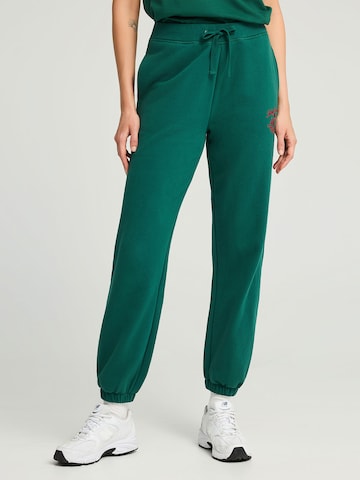 Regular Pantalon de sport Funky Buddha en vert : devant