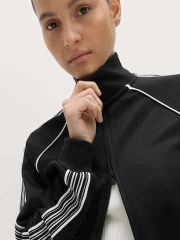 Marks & Spencer Trainingsjacke in Schwarz