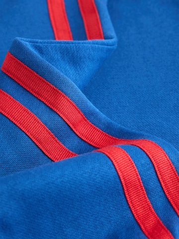 Next - Ropa para correr en azul