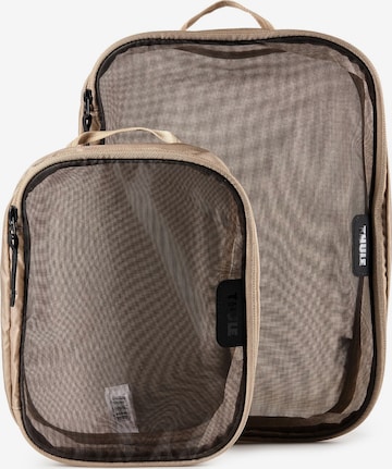 Sac à vêtements Thule en beige : devant