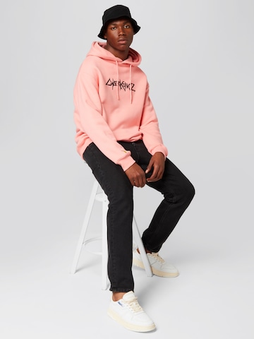 About You x Cyberkongz Sweatshirt 'Leo' in Roze