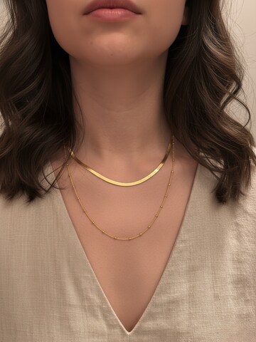 Chaîne caï en jaune : devant