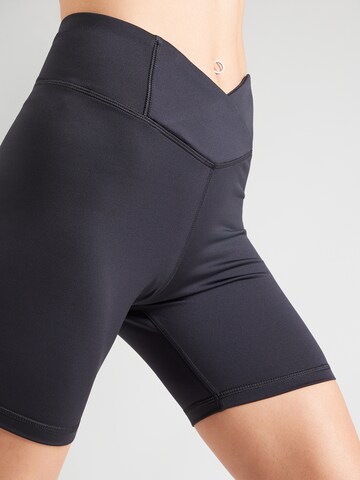 Reebok Skinny Sports trousers in Black