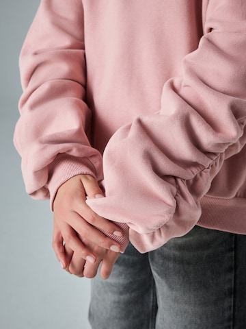 Pull-over smALLSAINTS en rose