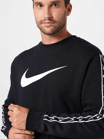 Bluză de molton de la Nike Sportswear pe negru