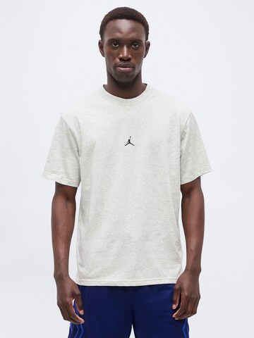 T-Shirt fonctionnel Jordan en gris : devant