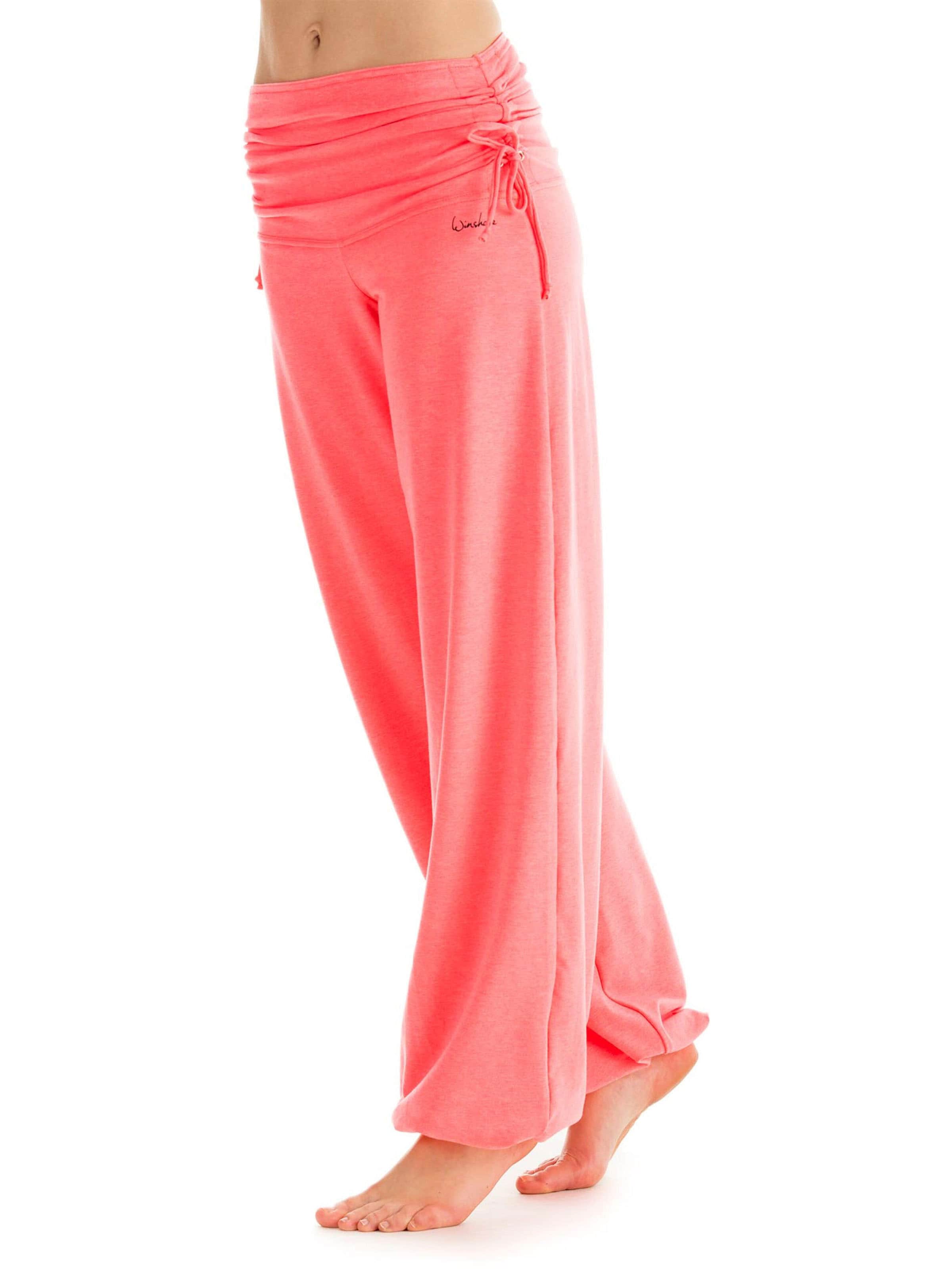 Winshape Дънки Tapered Leg Спортен панталон 'WH1' в оранжево: отпред