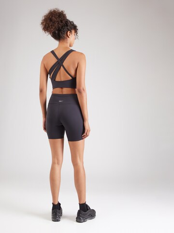 Reebok - Skinny Pantalón deportivo en negro