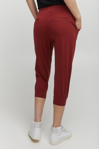 Tapered Pantaloni con pieghe 'Pandina' di b.young in rosso