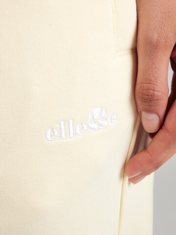 ELLESSE Tapered Pants 'LENTELLA' in Yellow