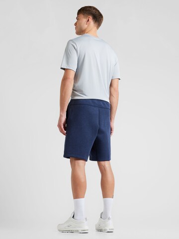 Nike Sportswear Ohlapna forma Hlače | modra barva