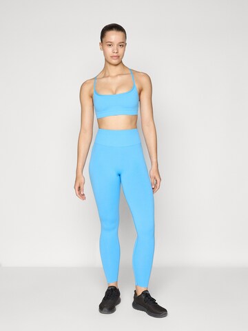 Fabletics Skinny Fit Спортен панталон в синьо