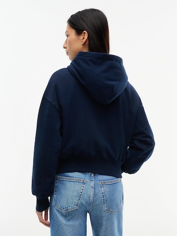Tommy Jeans Sweatshirt 'Arch' in Blauw