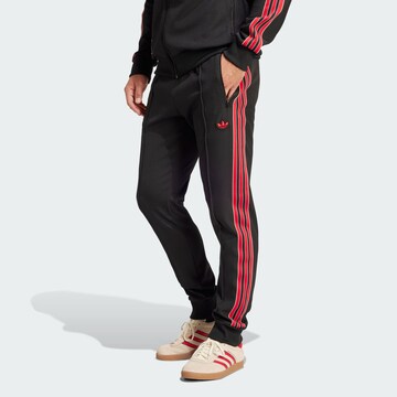ADIDAS ORIGINALS Конический (Tapered) Спортивные штаны 'Manchester United Terrace' в Черный: спереди