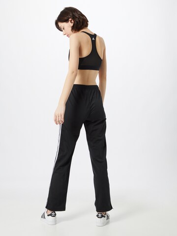 ADIDAS ORIGINALS Loosefit Broek 'Adicolor Classics Firebird' in Zwart