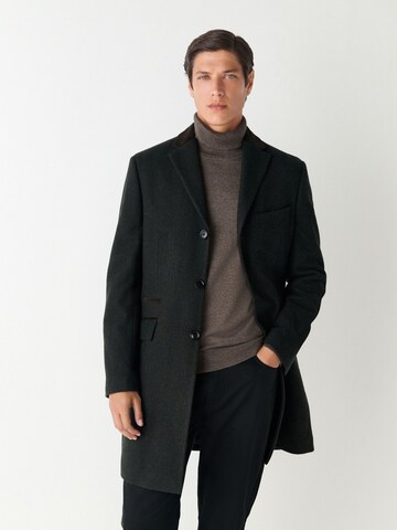 Next Mantel in Grün