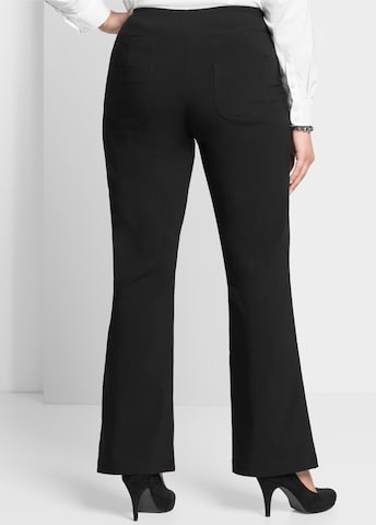 Bootcut Pantaloni modellanti di SHEEGO in nero