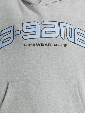 pelēks A-Game Sportiska tipa džemperis 'Rotate Logo'