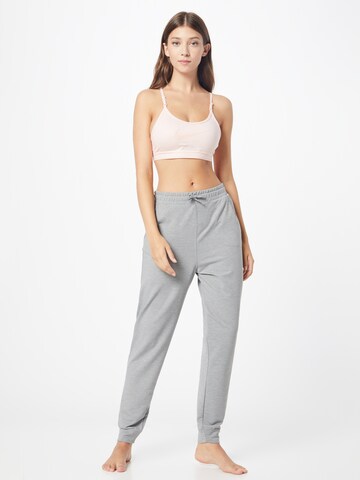 Effilé Pantalon de sport NIKE en gris