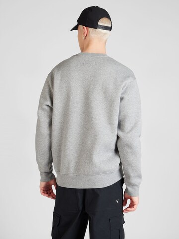 Sweat-shirt 'ESS' Jordan en gris