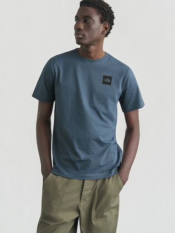 THE NORTH FACE Bluser & t-shirts i grå: forside