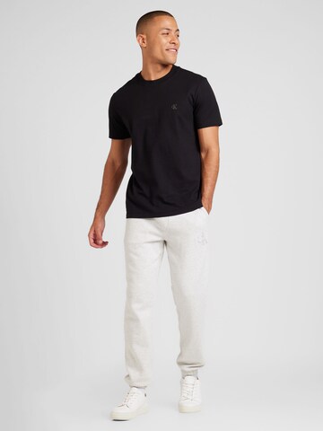 Effilé Pantalon Calvin Klein Jeans en gris