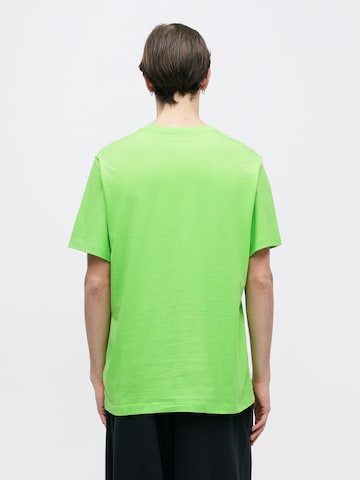 Nike Sportswear Regular Fit T-Shirt 'CLUB' in Grün