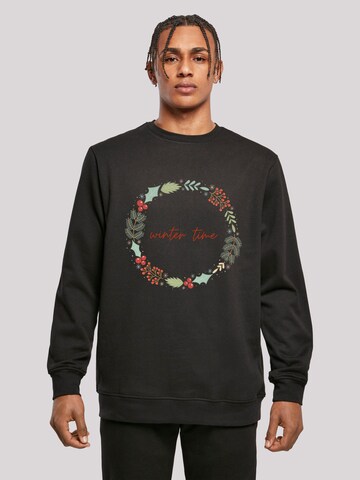 Sweat-shirt 'Winter Time' F4NT4STIC en noir : devant