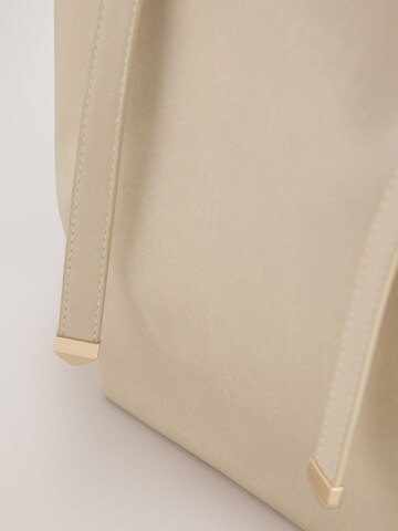 Sac bandoulière Next en beige